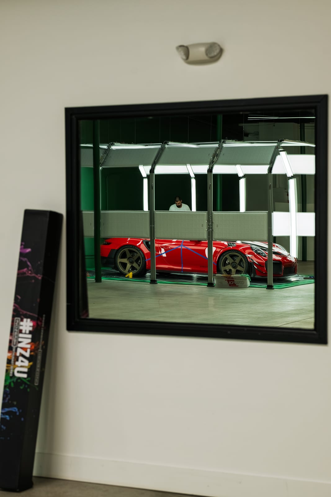 Wrapped red Porsche GT2 RS inside the WRPD shop in Chatsworth